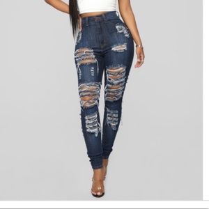 Distressed denim jeans